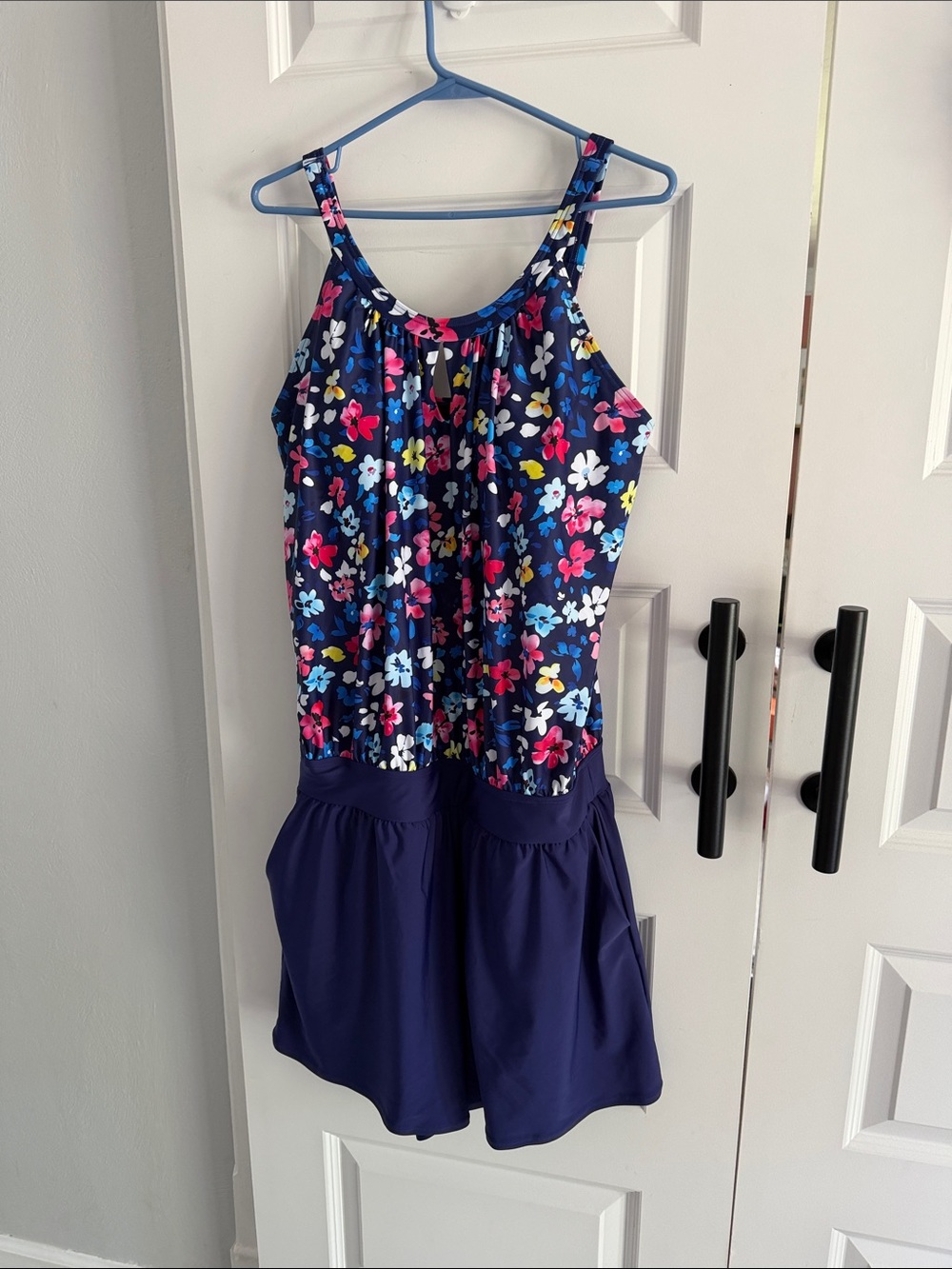 Navy Floral Sleeveless swim Romper with pockets 14/16